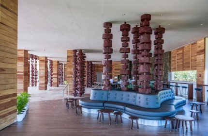 Interior of Platinum Yucatan Princess All Inclusive Suites & Spa Resort (Adults Only). Unique columns and modern design. Gay-friendly hotel.