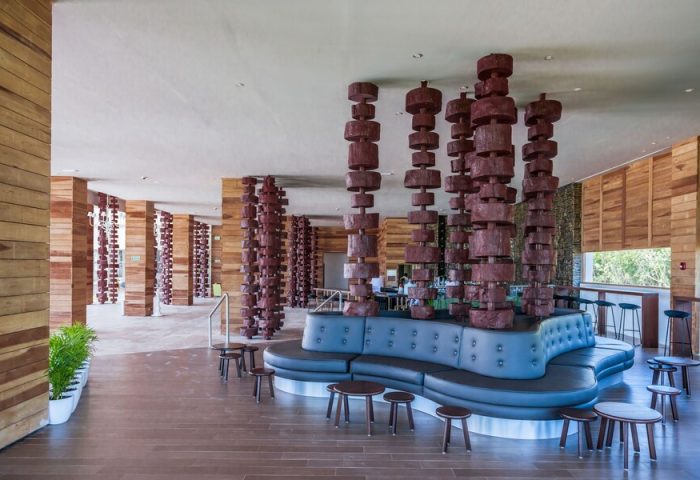 Interior of Platinum Yucatan Princess All Inclusive Suites & Spa Resort (Adults Only). Unique columns and modern design. Gay-friendly hotel.
