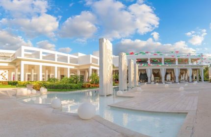 Platinum Yucatan Princess All-Inclusive Suites & Spa Resort Adults Only: Exterior view of a gay-friendly hotel with modern architecture and water features.