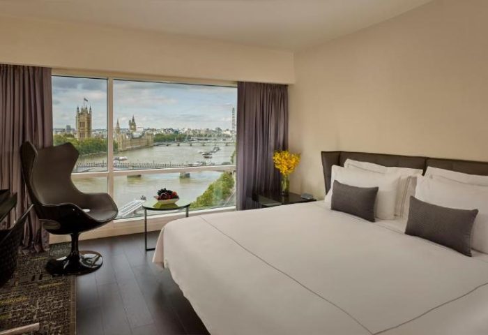 Park Plaza London Riverbank's gay-friendly, pet-friendly room. View of the River Thames and Houses of Parliament. Plaza on the River Club.