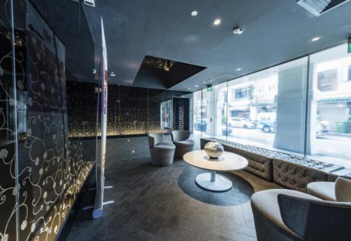 Porcelain Hotel by JL Asia lobby. Gay-friendly hotel with modern design, lounge area, and street view. Great for gay travel in Singapore.