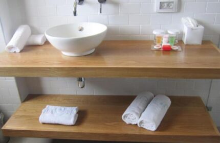 Prima City Tel Aviv Hotel bathroom. Modern sink, towels, and toiletries. Gay-friendly hotel in Tel Aviv for gay men travelers.