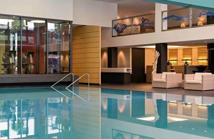 Pool at Gay-Friendly Pullman Berlin Schweizerhof Hotel. Gym, lounge area, and stylish design. Ideal for gay travelers in Berlin, Germany.