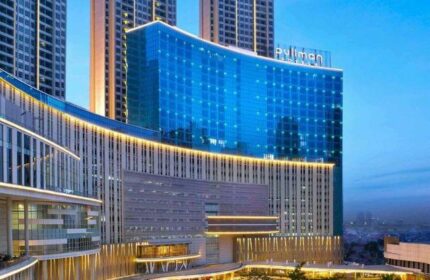 Pullman Jakarta Central Park Hotel exterior view. Gay-friendly hotel with modern architecture. Perfect for gay travel in Jakarta, Indonesia.