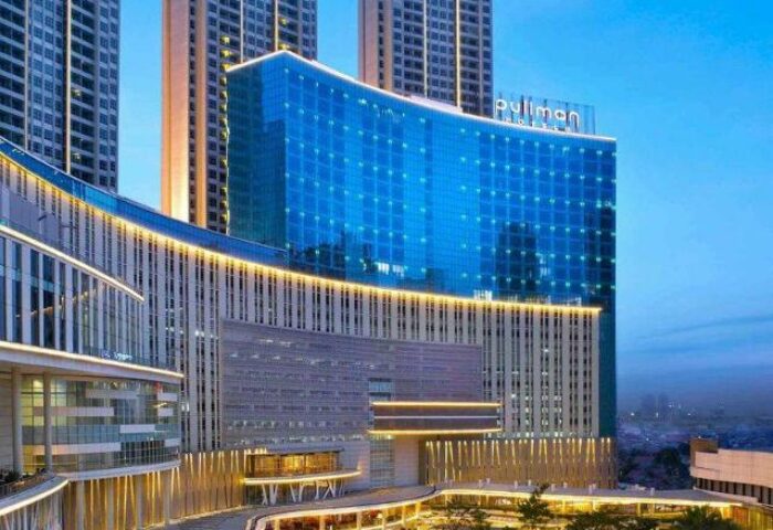 Pullman Jakarta Central Park Hotel exterior view. Gay-friendly hotel with modern architecture. Perfect for gay travel in Jakarta, Indonesia.
