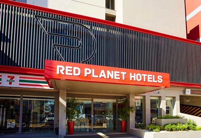 Red Planet Quezon Timog hotel exterior. Gay-friendly hotel with modern design. A great choice for gay travelers in Quezon City.