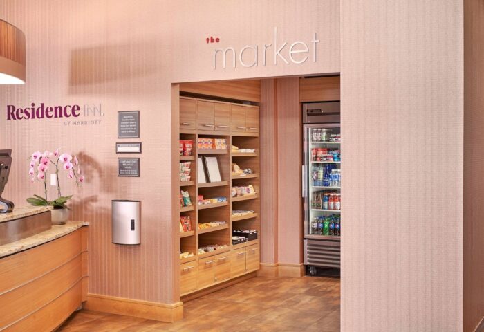 Residence Inn by Marriott Vancouver Downtown market. Gay-friendly hotel with snacks, drinks, and essentials for travelers.