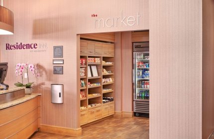 Residence Inn by Marriott Vancouver Downtown market. Gay-friendly hotel with snacks, drinks, and essentials for travelers.