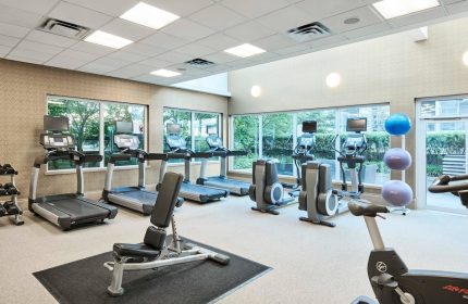 Residence Inn by Marriott Vancouver Downtown gym. Gay-friendly hotel fitness center with treadmills, weights, and exercise equipment.
