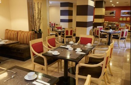 Hotel Royal Reforma gay-friendly hotel restaurant. Tables are set with cups and cutlery in Zona. A great place to stay for gay travelers.