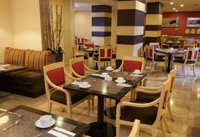 Hotel Royal Reforma gay-friendly hotel restaurant. Tables are set with cups and cutlery in Zona. A great place to stay for gay travelers.
