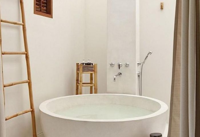 SALA Samui Choengmon Beach gay-friendly hotel bathroom. Round tub, bamboo ladder, and minimalist design for a relaxing gay travel experience.