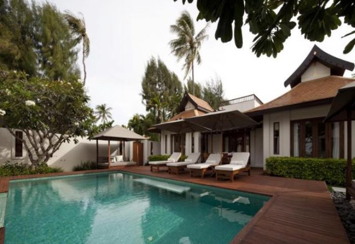 SALA Samui Choengmon Beach gay-friendly hotel pool view. Tropical resort with pool, lounge chairs, and modern Thai architecture. Ideal gay travel.