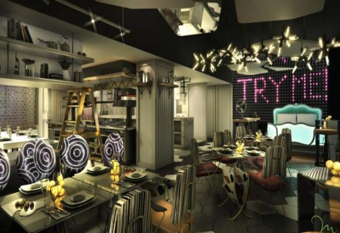 SO/ Sofitel Singapore's gay-friendly dining area. The restaurant features modern decor, stylish chairs, and a neon TRY ME sign.
