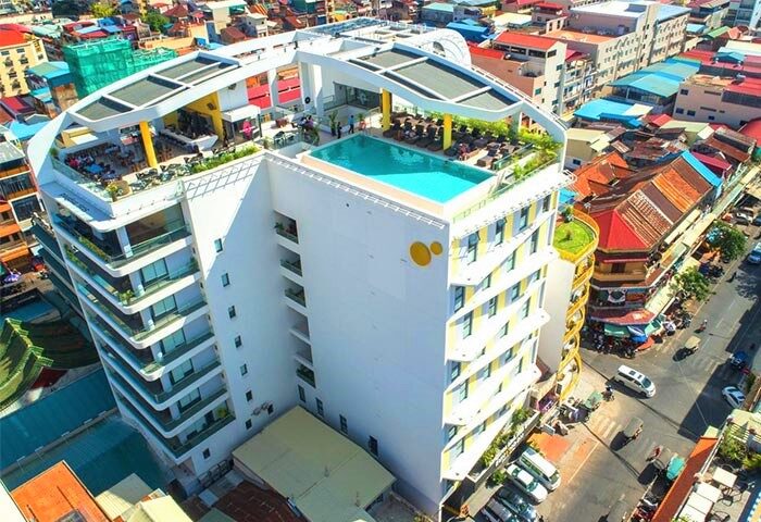 SUN & MOON Urban Hotel rooftop pool view. Gay-friendly hotel with city views, bar, and restaurant. Perfect for gay travelers' urban escape.