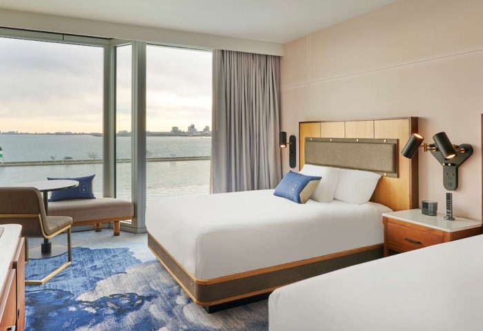 Sable at Navy Pier Chicago, Curio Collection by Hilton guest room. Gay-friendly hotel with waterfront views. Modern design, two beds.