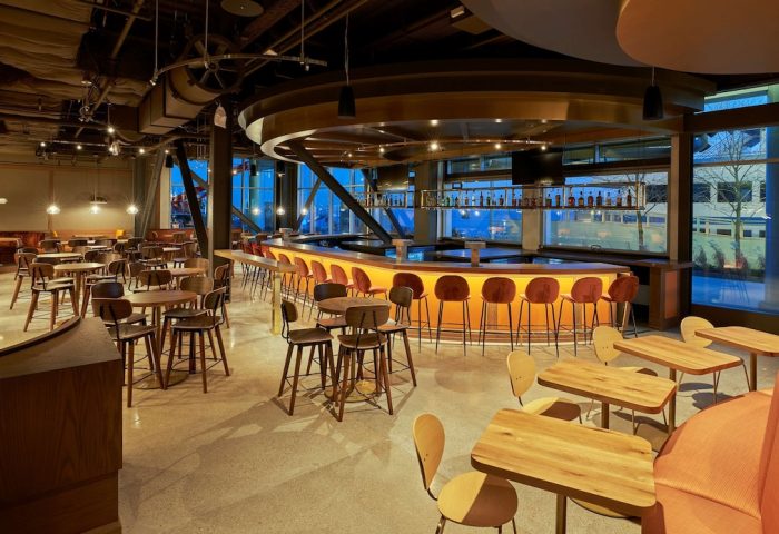 Sable at Navy Pier Chicago, Curio Collection by Hilton's bar area. A gay-friendly hotel with a modern design and a lively atmosphere.