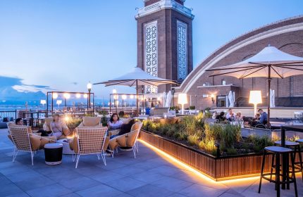Rooftop lounge at Gay-Friendly Sable at Navy Pier Chicago, Curio Collection by Hilton. Outdoor seating, tower view. Chicago travel advice.