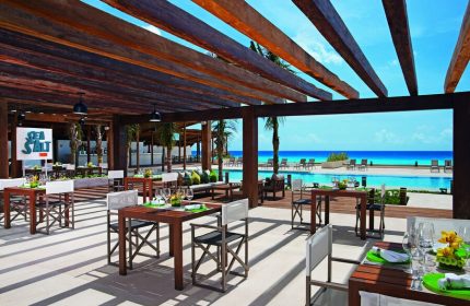Secrets The Vine Cancun Resort & Spa all-inclusive adults-only gay-friendly hotel. Sea Salt restaurant with ocean view.