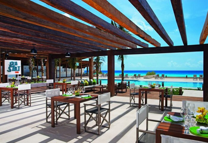 Secrets The Vine Cancun Resort & Spa all-inclusive adults-only gay-friendly hotel. Sea Salt restaurant with ocean view.
