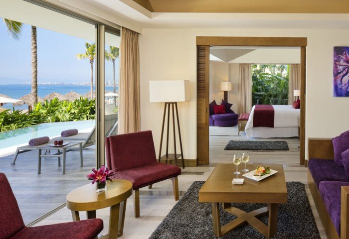 Secrets Vallarta Bay Resort All-Inclusive Adults-only suite. Gay-friendly hotel room with ocean view, pool, and luxurious amenities.