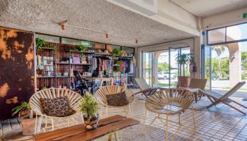 Selina Cancun Laguna Hotel Zone's chill lounge area. This gay-friendly hotel in Cancun offers a stylish, relaxed vibe for LGBTQ+ travelers.