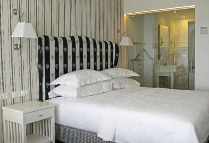 Shalom Hotel & Relax, an Atlas Boutique Hotel room. Gay-friendly, pet-friendly hotel bedroom with ensuite bathroom. Modern design.