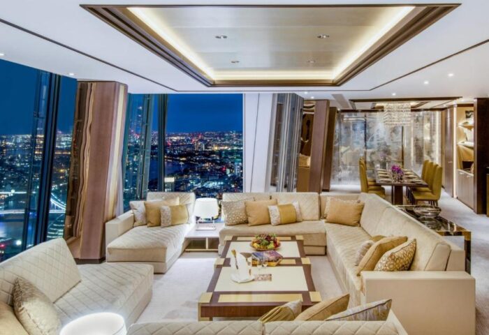 Shangri-La Hotel At The Shard's gay-friendly suite. London skyline view from luxury room. Stylish interior, perfect for gay travelers.