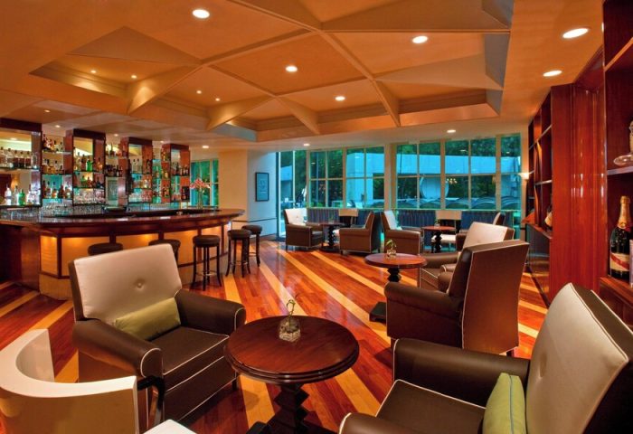Sheraton Mexico City Maria Isabel Hotel bar. Gay-friendly hotel lounge area with bar, seating, and wood floors. Mexico City travel.