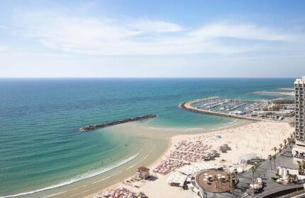 Gay-friendly Sheraton Tel Aviv Hotel view. Beach, marina, and sea. A pet-friendly hotel for gay men's travel advice in Tel Aviv.