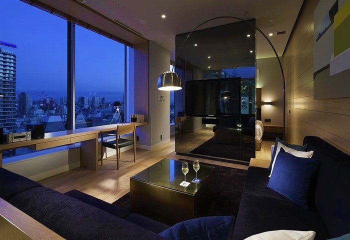 Shinjuku Granbell Hotel room with city view at night. Gay-friendly hotel in Shinjuku, Japan. Modern design, perfect for gay travelers.