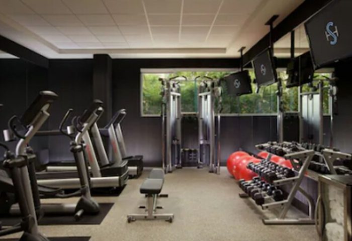 Shore Hotel's gym, a gay-friendly hotel, features treadmills, weights, and TVs. A great place to stay for gay men looking to stay fit on vacation.