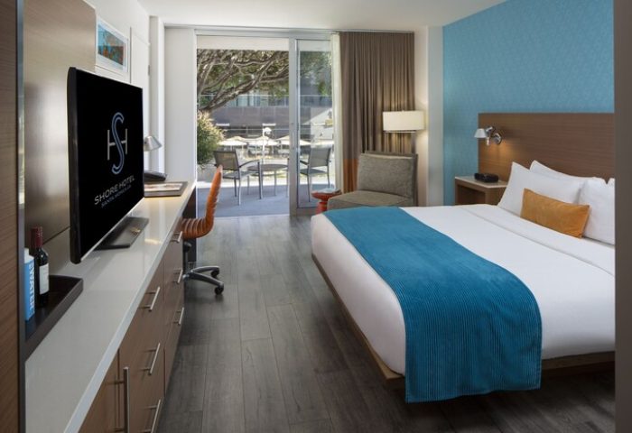 Shore Hotel room with balcony. Gay-friendly hotel in Santa Monica offers modern rooms with outdoor spaces. Perfect for LGBTQ+ travelers.