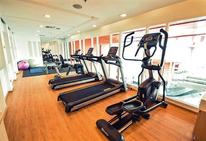 Gym at Sleep with Me Hotel Design Hotel at Patong, a gay-friendly hotel. Treadmills, elliptical machine, weights, and exercise balls.