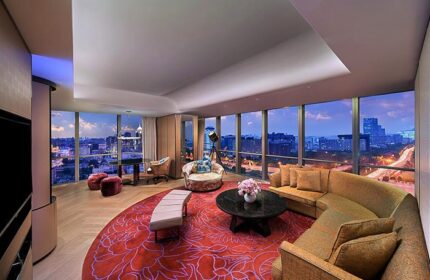 Gay-Friendly Hotel Sofitel Beijing Central: Upscale suite with city views. Luxurious interior, perfect for gay travelers seeking comfort & style.