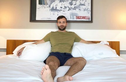 Gay-Friendly Hotel Sofitel Berlin Kurfurstendamm: Man relaxing on a bed. Pet-friendly hotel. Dorint Kurfurstendamm Hotel for gay travel.