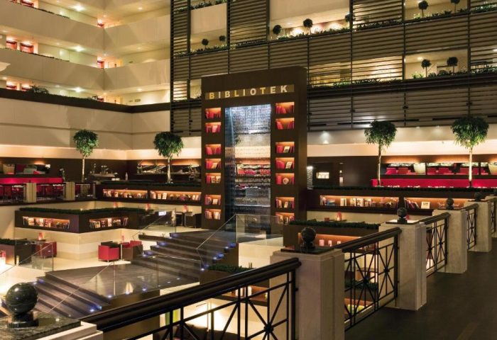 Sofitel Budapest Hotel's interior. A gay-friendly, pet-friendly hotel with a library, Bibliotek is written on it. Interior design with books.