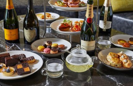 Sofitel Chicago Magnificent Mile gay-friendly hotel afternoon tea. Champagne, macarons, pastries, and finger sandwiches.