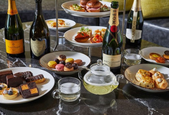 Sofitel Chicago Magnificent Mile gay-friendly hotel afternoon tea. Champagne, macarons, pastries, and finger sandwiches.