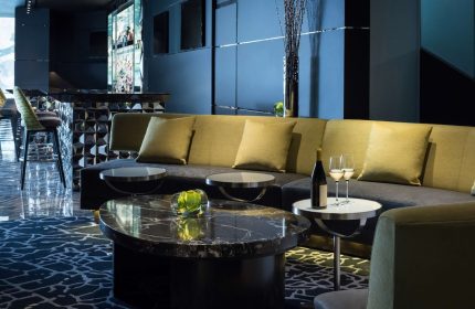Sofitel Chicago Magnificent Mile's bar. Gay-friendly hotel with seating, wine, and cocktail bar. Upscale design, perfect for gay travelers.