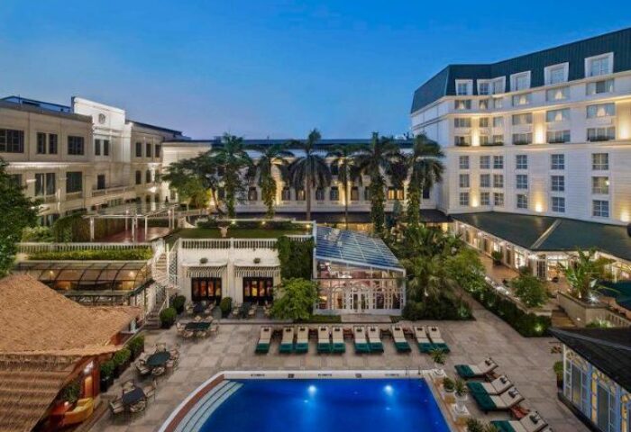 Sofitel Legend Metropole Hanoi Hotel's pool area. A gay-friendly hotel in Hanoi, Vietnam, perfect for gay men's travel.