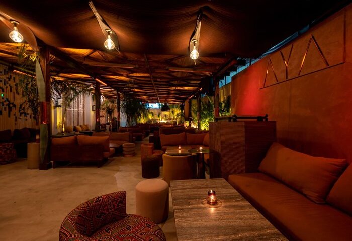 Sofitel Los Angeles at Beverly Hills Hotel's AYA Restaurant. Gay-friendly hotel with stylish seating, warm lighting, and exotic decor.