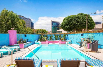 Sofitel Los Angeles at Beverly Hills Hotel pool. Gay-friendly hotel with colorful design, perfect for gay men travel. #gaytravel