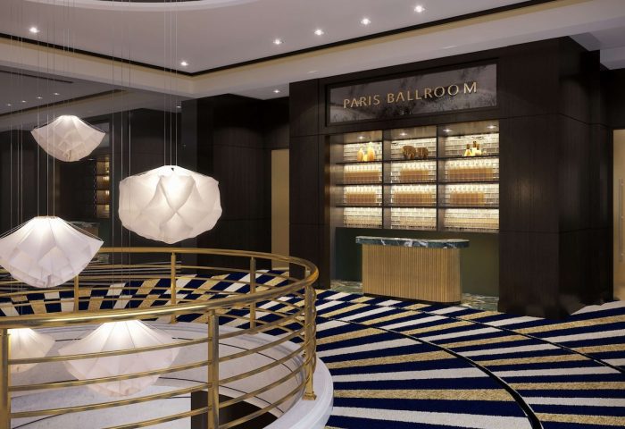 Sofitel New York's Paris Ballroom entrance. Gay-friendly hotel with modern design, unique lighting, and stylish decor. Luxury travel for gay men.