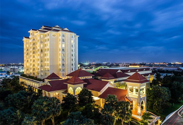 Sofitel Phnom Penh Phokeethra Hotel view at dusk. Gay-friendly hotel, luxury accommodation for gay travelers in Phnom Penh, Cambodia.