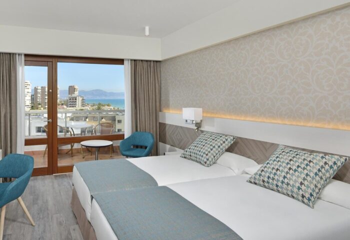 Sol Torremolinos Don Pablo gay-friendly hotel room. Twin beds, balcony with sea view. Ideal accommodation for gay travelers.