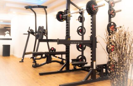 Steigenberger Hotel Koln's gym. Gay-friendly hotel features weightlifting equipment, a bench, and a pull-up bar for a complete workout.