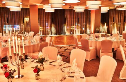 Event space at the gay-friendly Steigenberger Hotel Köln, Germany. Tables set for a wedding or party. Ideal for gay travelers.