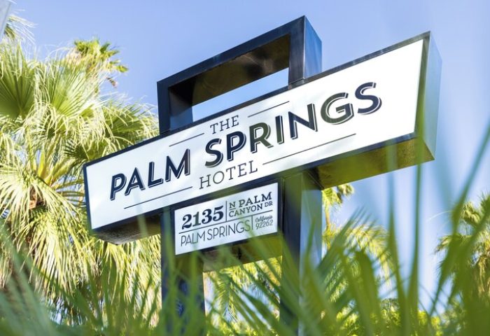 The Palm Springs Hotel sign. Gay-friendly hotel in Palm Springs, California. Address: 2135 N Palm Canyon Dr. A top choice for gay men travelers.