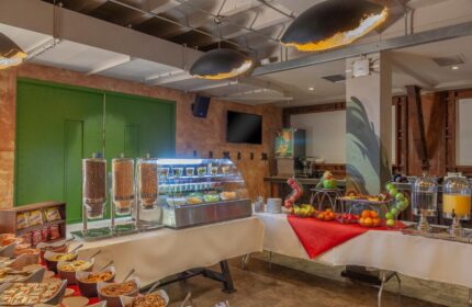 Breakfast buffet at Temple Bar Inn, a gay-friendly hotel. Cereal dispensers, pastries, fruit, and juice offer a variety of options.